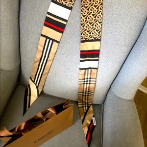 Burberry scarf. Very dainty. Pretty much brand new only worn once.